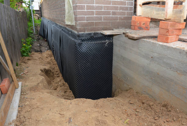 Happy homeowners after waterproofing job in Mount Gilead